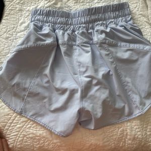 Lulu track that shorts 3” inseam. Lilac purple color